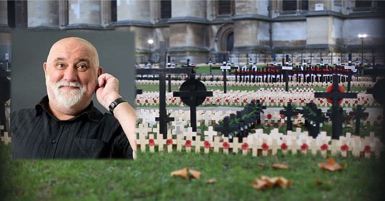 Alexei Sayle on top of a picture of Poppies outside a church