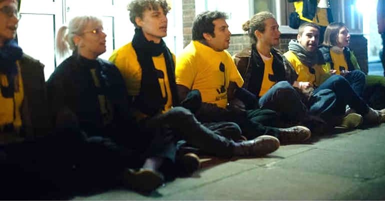 Jewish protesters blockade the doors of a UK Lawyers for Israel event