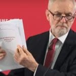 Jeremy Corbyn holding leaked NHS documents