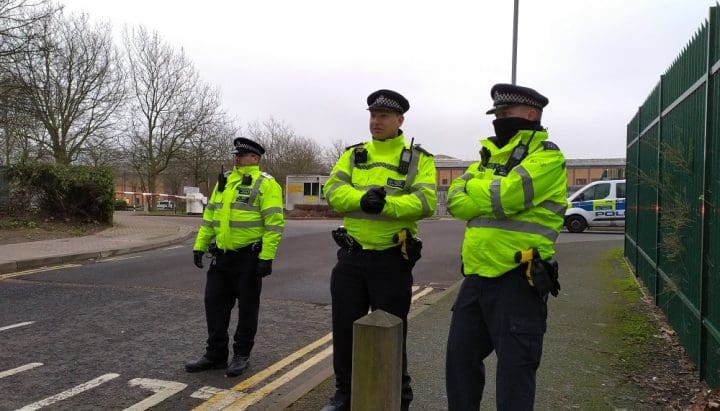Three coppers stand outside of Belmarsh prison grounds
