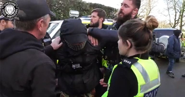 Cheshire Police arresting a member of Stockport Monitors