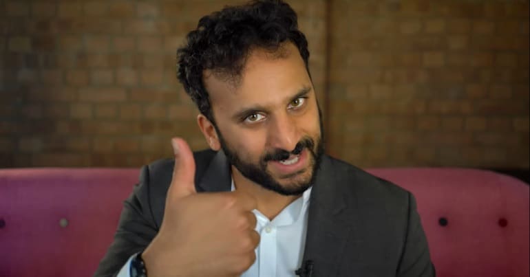 Comedian Nish Kumar giving a thumbs up