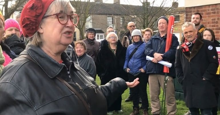 residents protest against racism outside Norfolk tower block