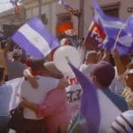 People in Nicaragua waving flags