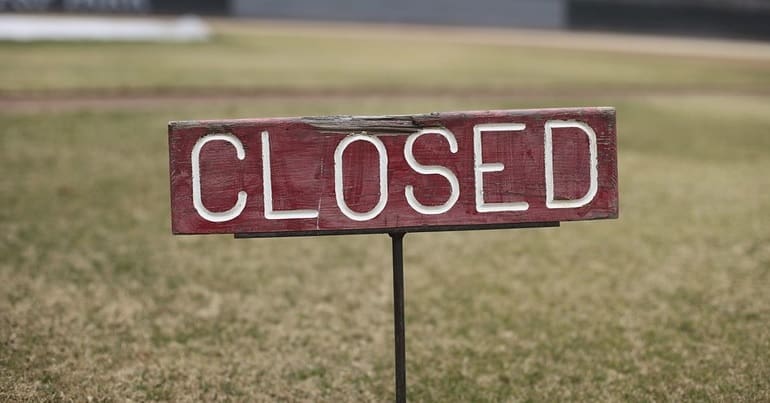 A closed sign at a park