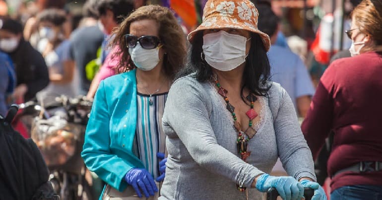 People in Chile with face masks on