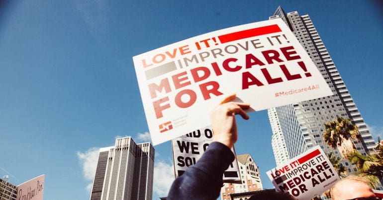 Protest sign calling for Medicare-for-all