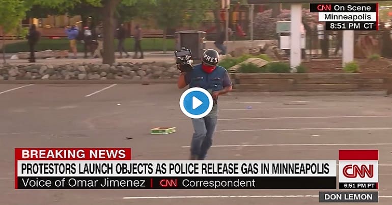 A CNN Still of a journalist fleeing during a George Floyd protest