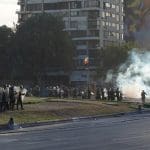 Chilean police firing tear gas at protesters