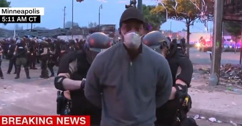 CNN reporter Omar Jimenez and his crew are arrested by Minneapolis police while reporting at a protest