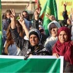 Yezidi people protesting on 16 June