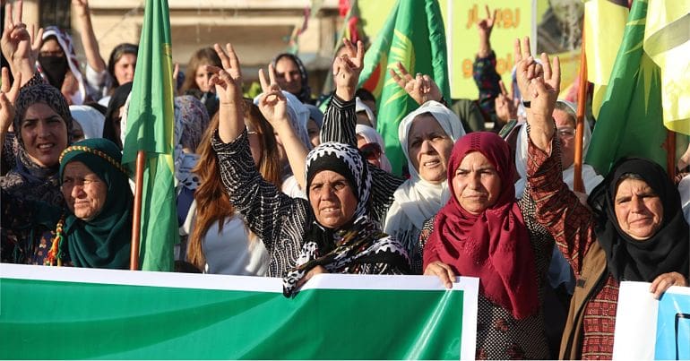 Yezidi people protesting on 16 June