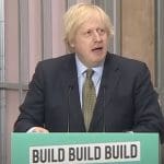 Boris Johnson making his coronavirus recovery speech behind a lecturn that reads 'build build build'