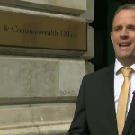 Dominic Raab standing in front of Foreign and Commonwealth Office