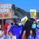 Refugees welcome - beach Tenby Wales