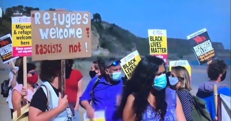 Refugees welcome - beach Tenby Wales