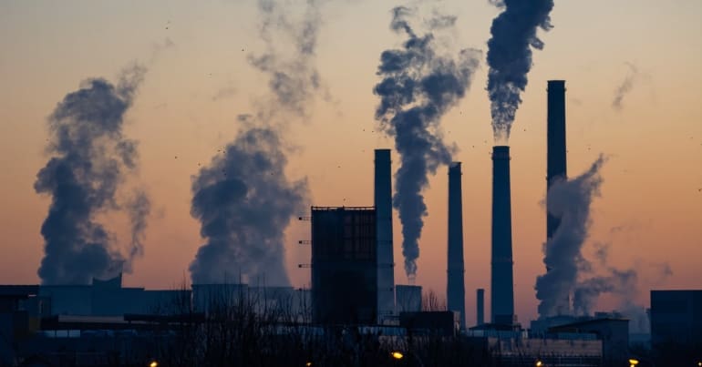 Smoke rising from industrial chimneys