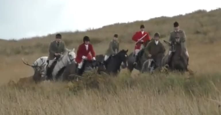 Riders from Devon and Somerset Staghounds chase a deer across Exmoor