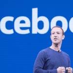 A picture of the Facebook logo and Mark Zuckerberg