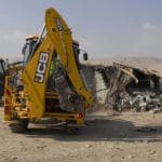 JCB equipment is used in a West Bank home demolition