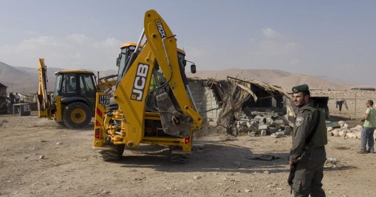 JCB equipment is used in a West Bank home demolition