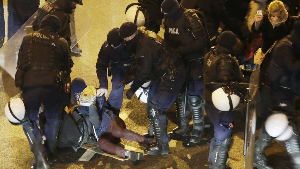 Police and protesters in Poland