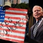 Yankees go home written on US flag and Joe Biden