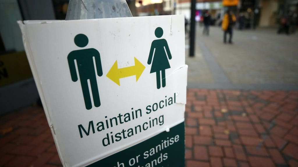 A social distancing sign