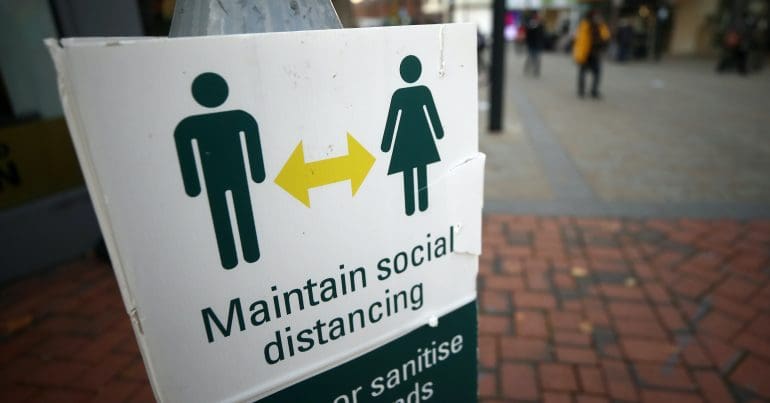 A social distancing sign