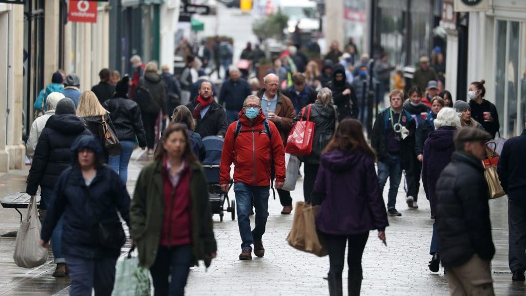 People walking down a high street