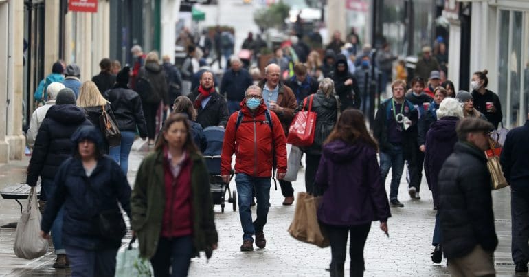 People walking down a high street