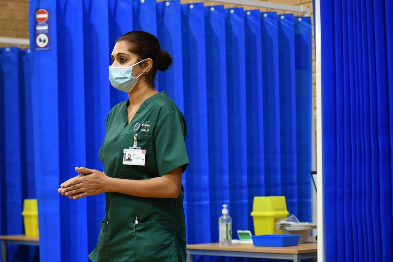 A healthcare worker wearing a mask