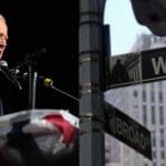 US president-elect Joe Biden and Wall Street sign, New York