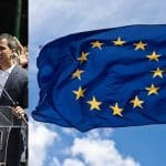 Juan Guaidó and a flag of the European Union