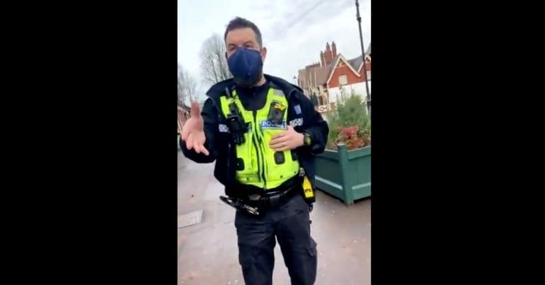 One of the police officers who arrested a commuter
