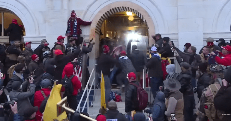 Rioters storming US Capitol building in Washington, D.C.