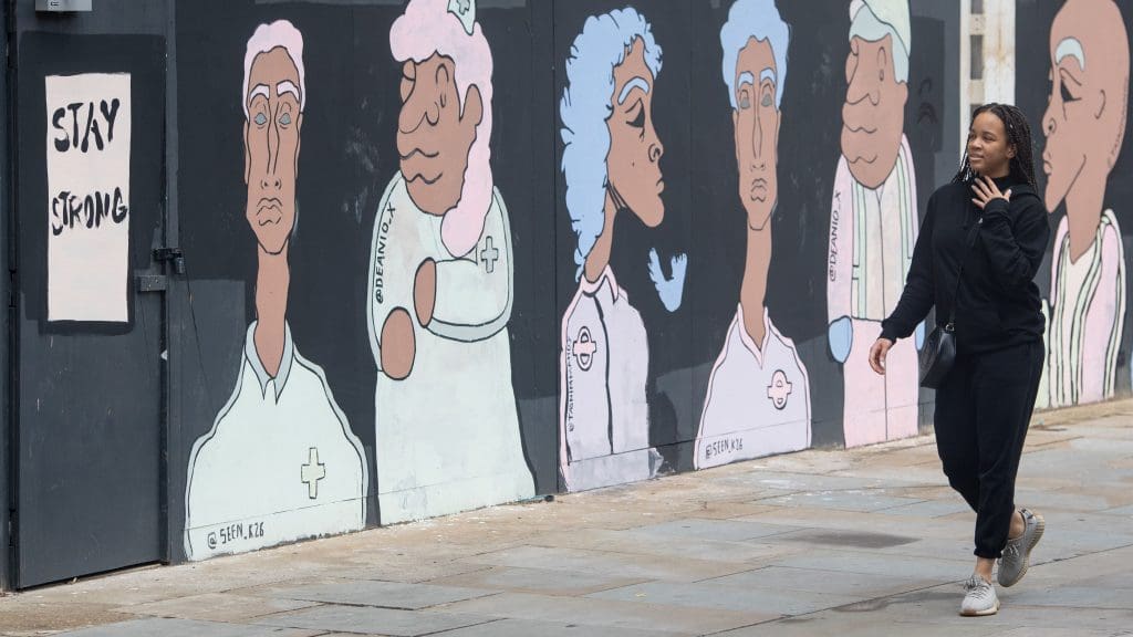 A mural depicting BAME British people
