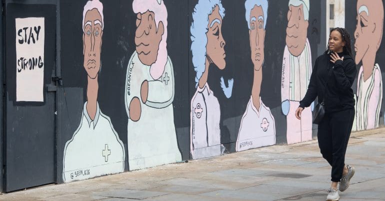 A mural depicting BAME British people