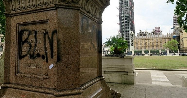 BLM graffiti on a plinth