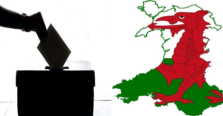Ballot box and a map of Wales with Welsh flag
