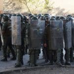 Chile police with riot shields