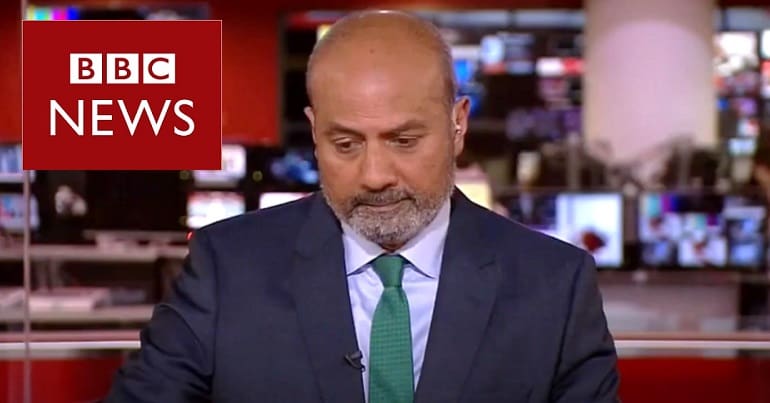 George Alagiah and the BBC News logo