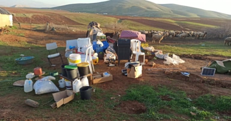 Palestinian people's belongings left out in the open after Israeli demolitions