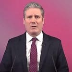 Keir Starmer and a Labour Party backdrop