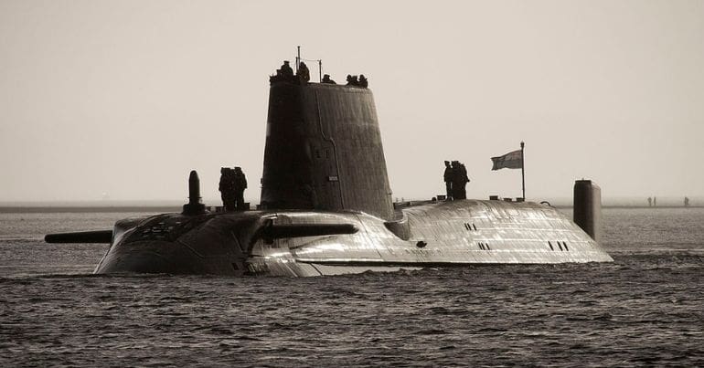 A submarine at the surface of the water