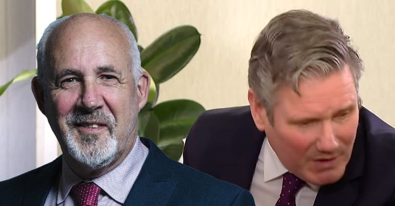 Keir Starmer looking away from Jon Trickett