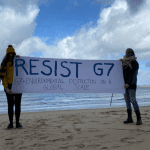 resist g7 banner