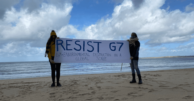 resist g7 banner