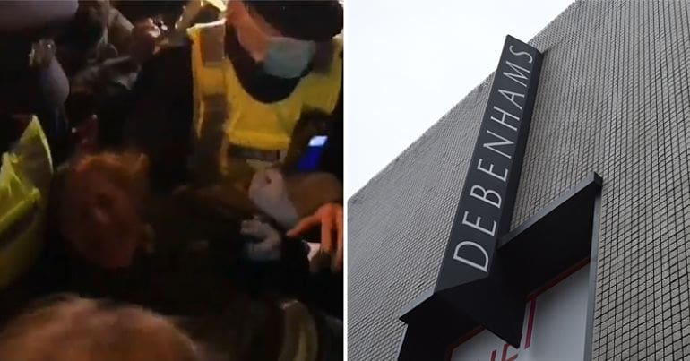 Irish police drag away a protesters and Debenhams store logo
