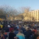 People sit down at an intersection in Bristol